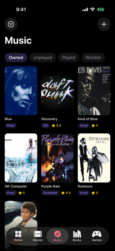 Keptcase music collection with Purple Rain on cassette, Kind of Blue on vinyl, and Discovery on CD